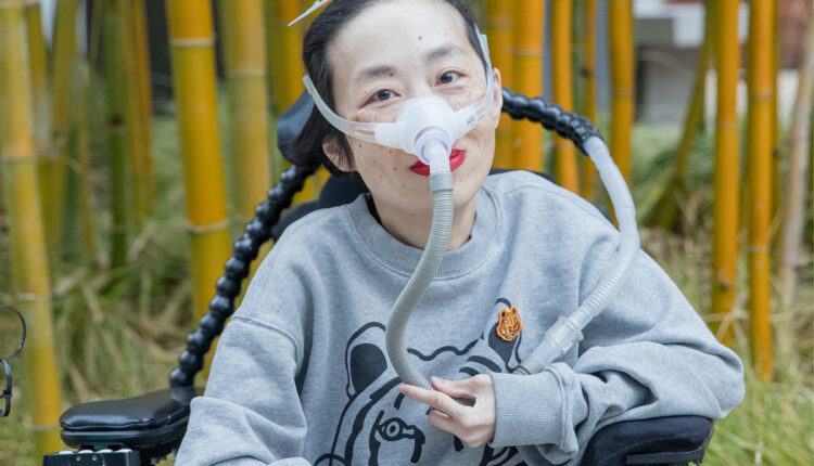 A photograph of Alice Wong, an activist and writer, is seen.
