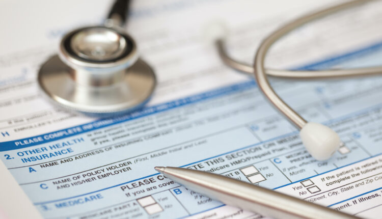 Patient record form with stethoscope