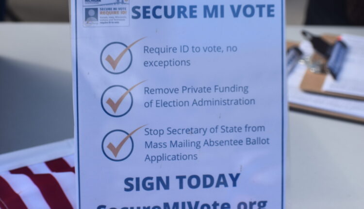 Voter restriction ballot proposal turns in signatures — but may not head to voters ⋆ Michigan Advance