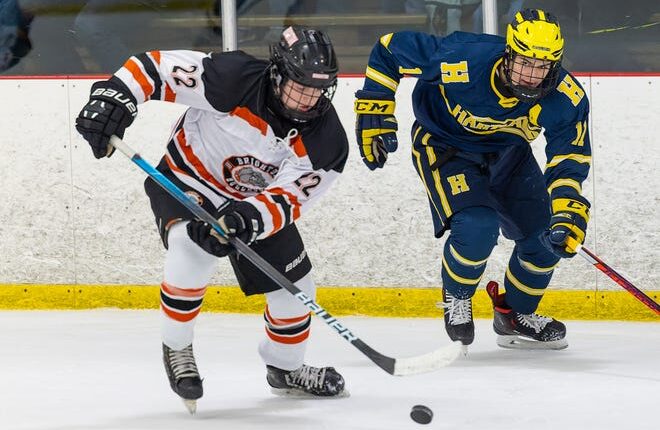Lane Petit (22) and his Brighton teammates are ranked No.  4 in Division 1, while Ben Pouliot (11) and his Hartland team is ranked No.  2 in the first state rankings.