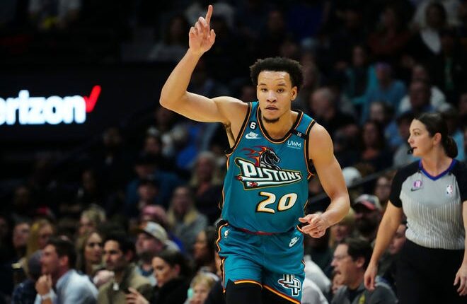 Pistons forward Kevin Knox II reacts to his 3-point basket in the second quarter against the Nuggets on Tuesday, Nov. 22, 2022 in Denver.