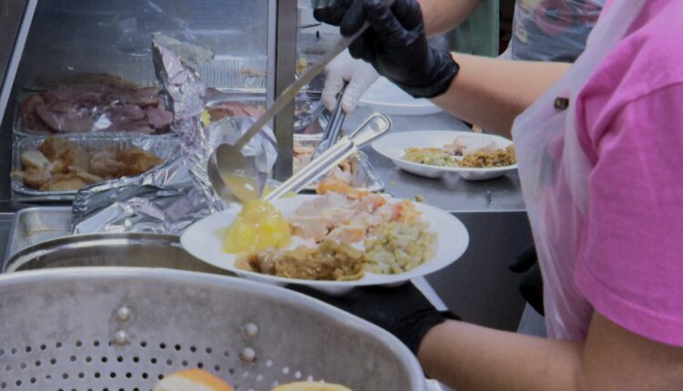 Lansing nonprofit continues tradition of giving out Thanksgiving meals
