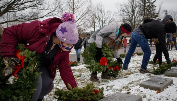Wreaths laid for veterans at Lansing's Little Arlington at Evergreen Cemetery
