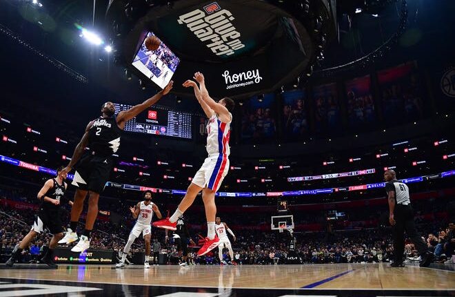 Detroit Pistons forward Bojan Bogdanovic (44) shoots against Los Angeles Clippers forward Kawhi Leonard (2) during the second half at Crypto.com Arena in Los Angeles on Thursday, Nov. 17, 2022.