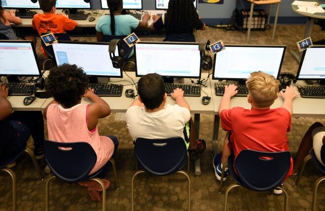 Some Michigan teachers are wary that students may try to use artificial intelligence software in school assignments and are developing ways to discourage or avoid their use.