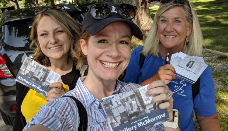 Democratic State Sen. Mallory McMorrow (center), who serves on the Elections and Ethics Committee, says an early primary will give Michigan an "opportunity to show the rest of the country why this is a state that can and should lead the way for presidential elections."